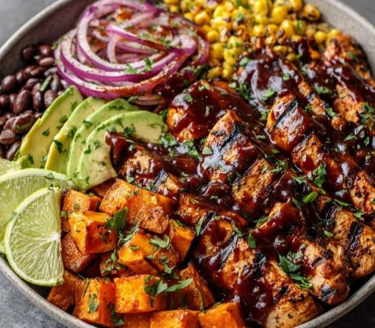 BBQ Chicken Sweet Potato Bowl with colorful ingredients on a plate