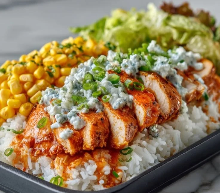 Buffalo Chicken Protein Bowl with vegetables and sauce