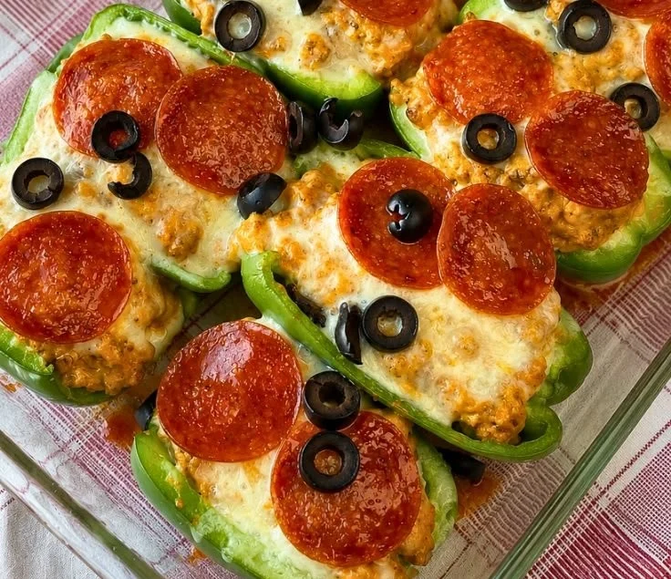 Delicious creamy pizza stuffed peppers ready to be served.