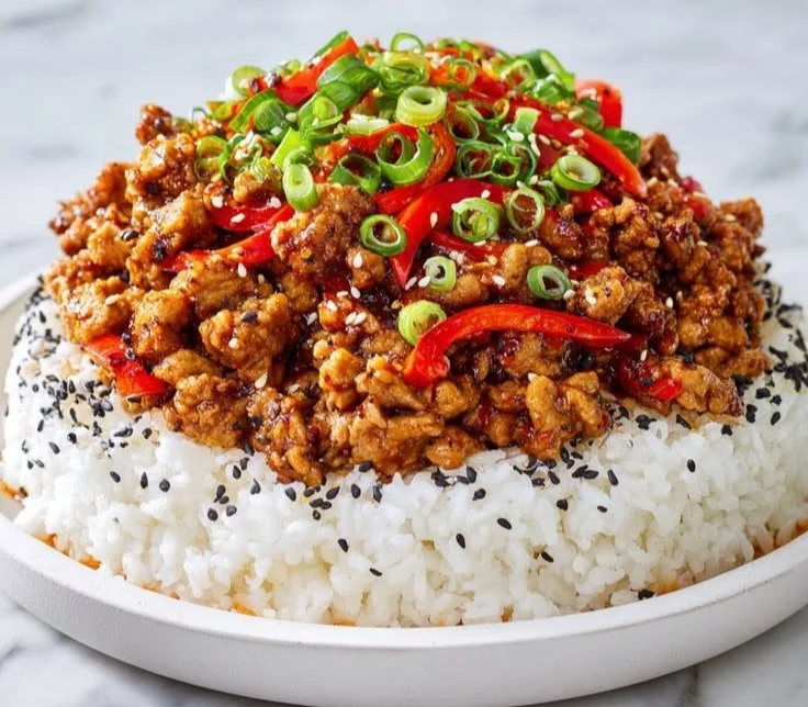 Firecracker Ground Chicken sizzling in a pan with vibrant spices