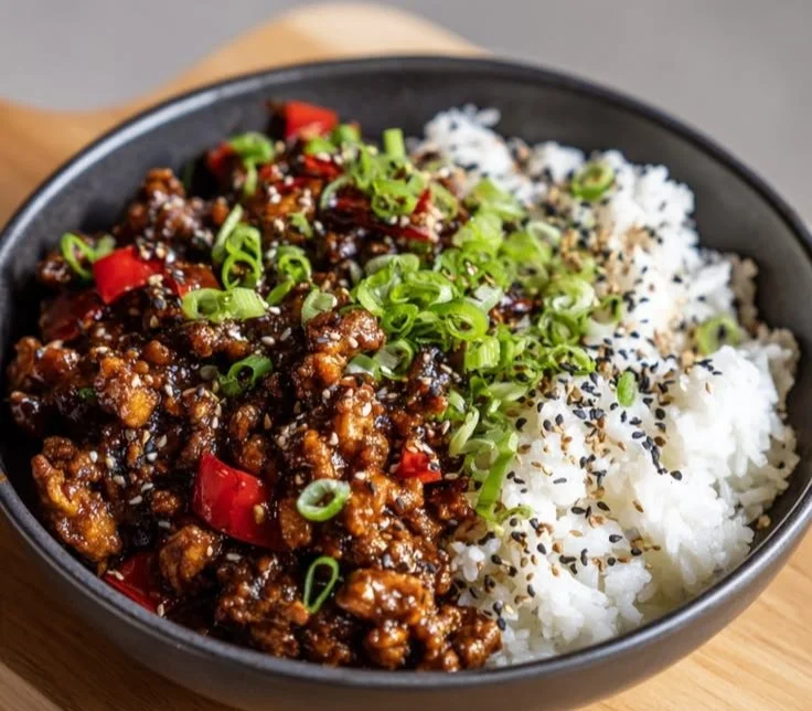Firecracker Ground Chicken dish cooked in a skillet with vibrant colors and seasonings.