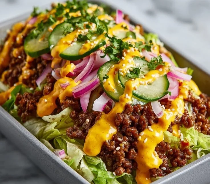 High Protein Big Mac Bowl with lettuce, tomatoes, and beef in a bowl