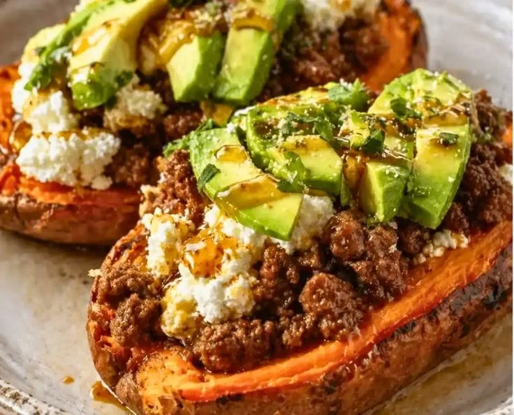 Hot Honey Beef Sweet Potato Boats topped with smoky, sweet, and spicy flavors