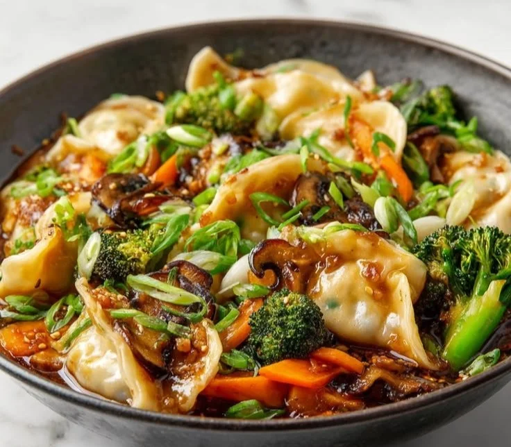 Delicious potsticker stir fry served in a colorful bowl