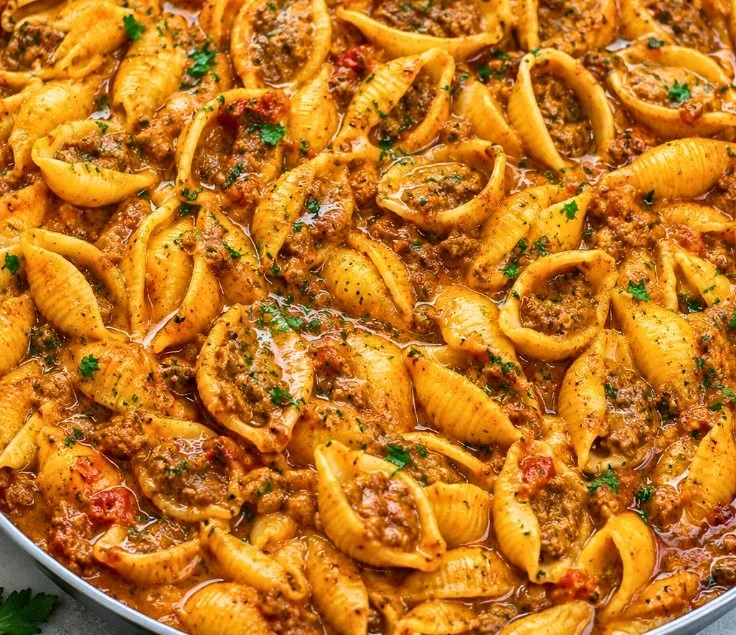Creamy beef and shells dish served on a plate, perfect for weeknight dinners.