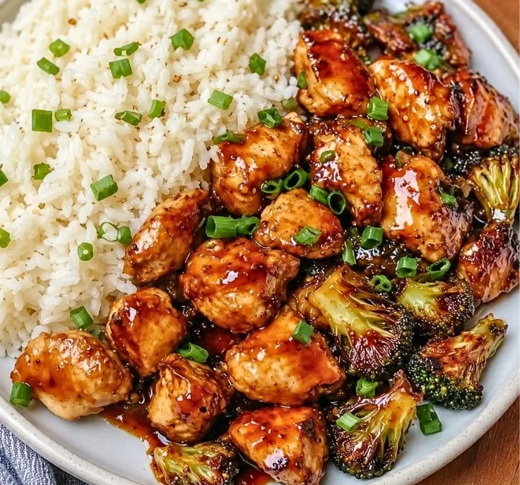 Crispy sweet chili chicken served with Brussels sprouts in an air fryer dish